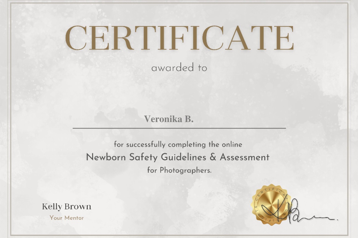 Image of a formal certificate showcasing completion of Newborn Photography Safety training; the certificate features professional accreditation details and serves as evidence of the photographer's expertise in ensuring the safety and well-being of newborns during photoshoots.